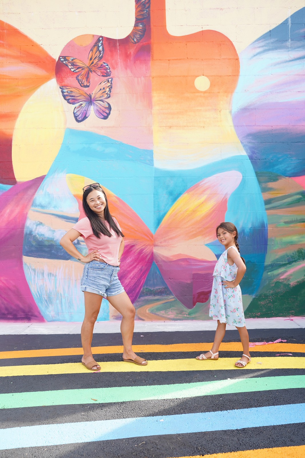 Guests in front of the mural